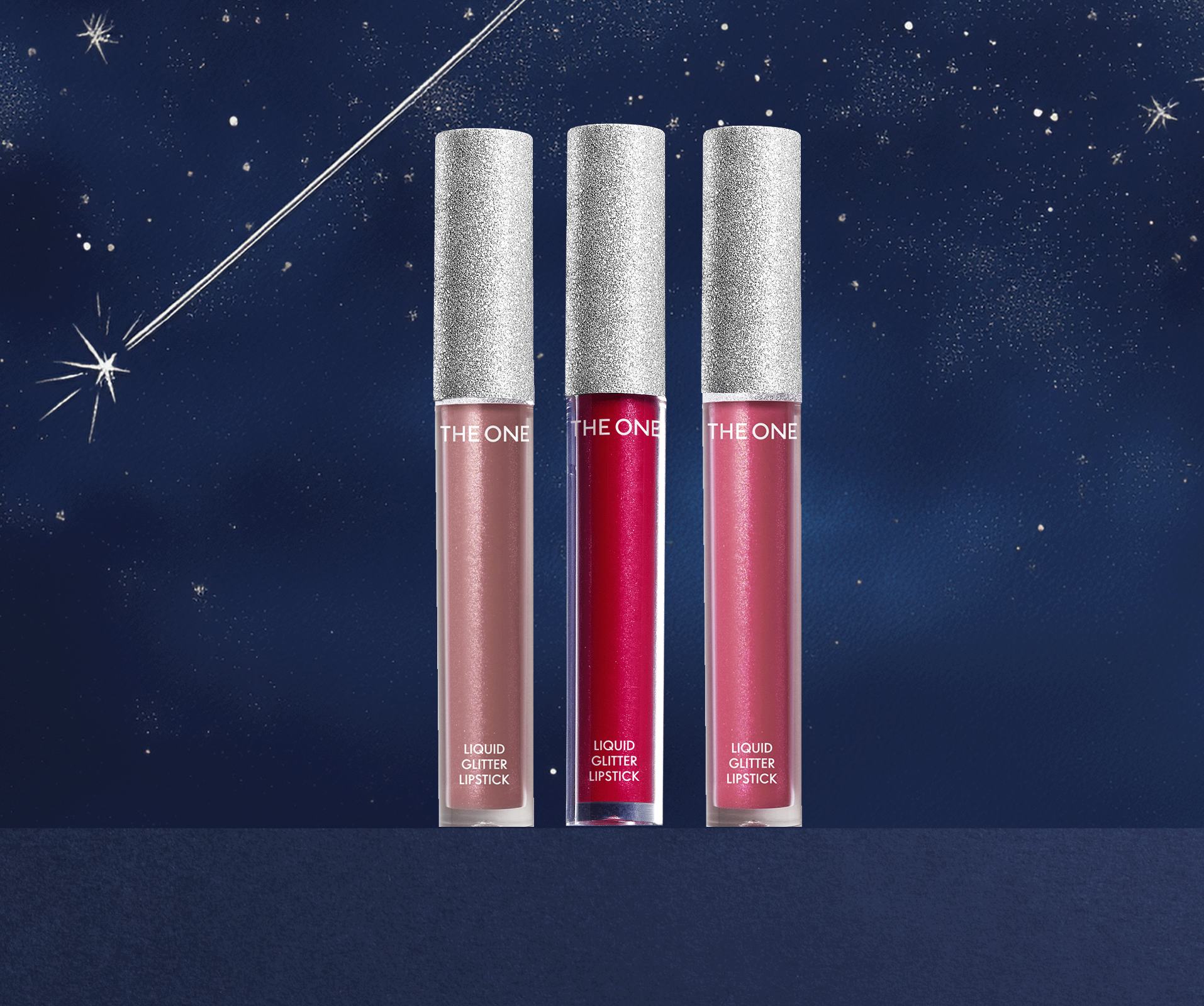 a group of lip glosses with glitter caps