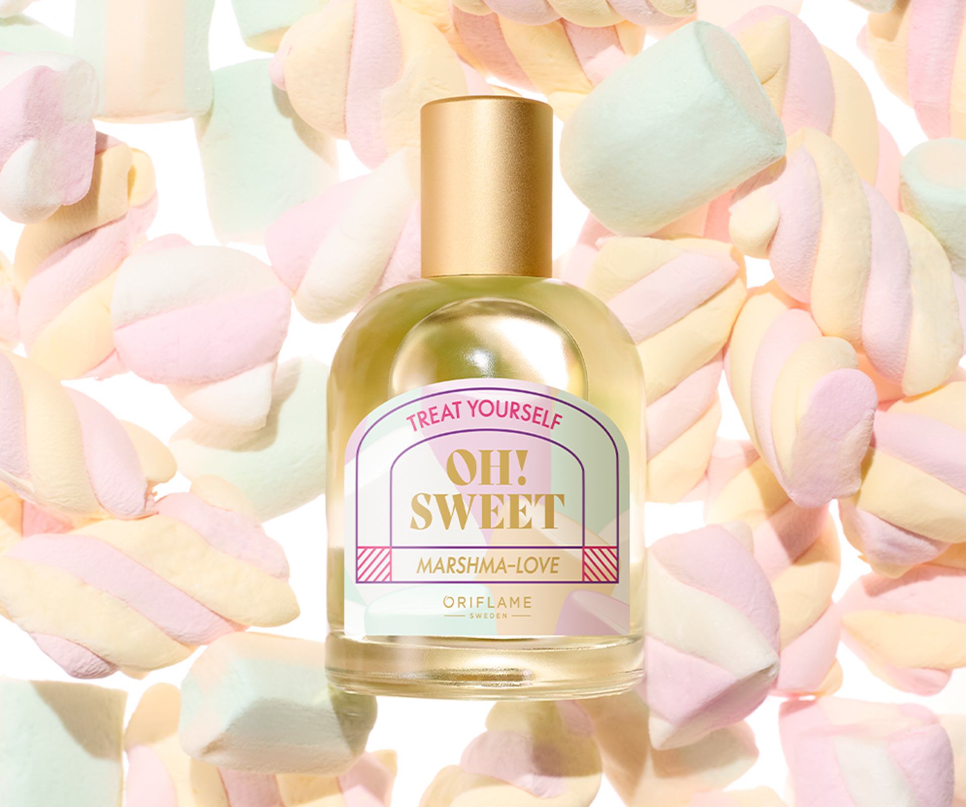 a bottle of perfume surrounded by marshmallows