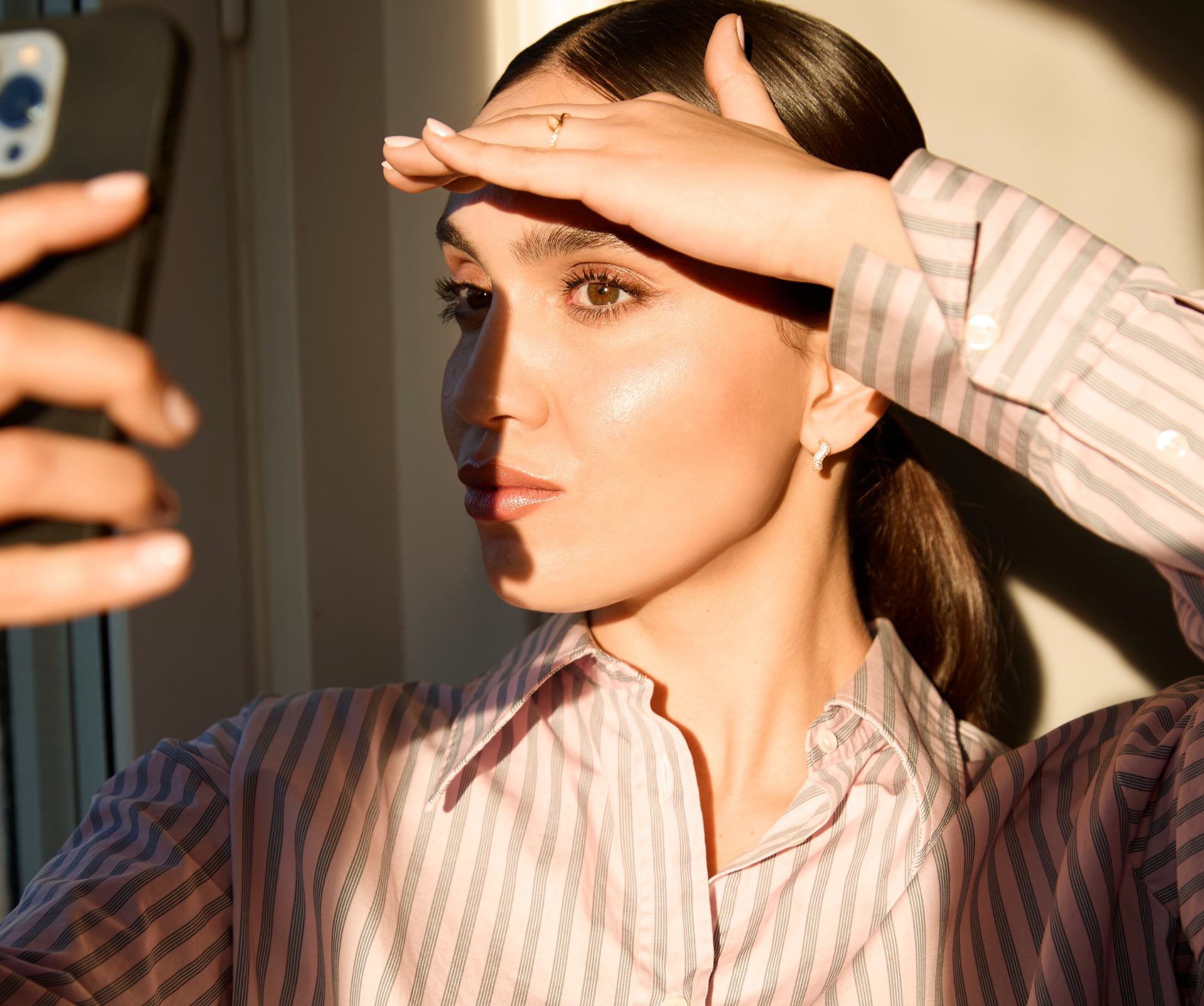 a woman taking a selfie