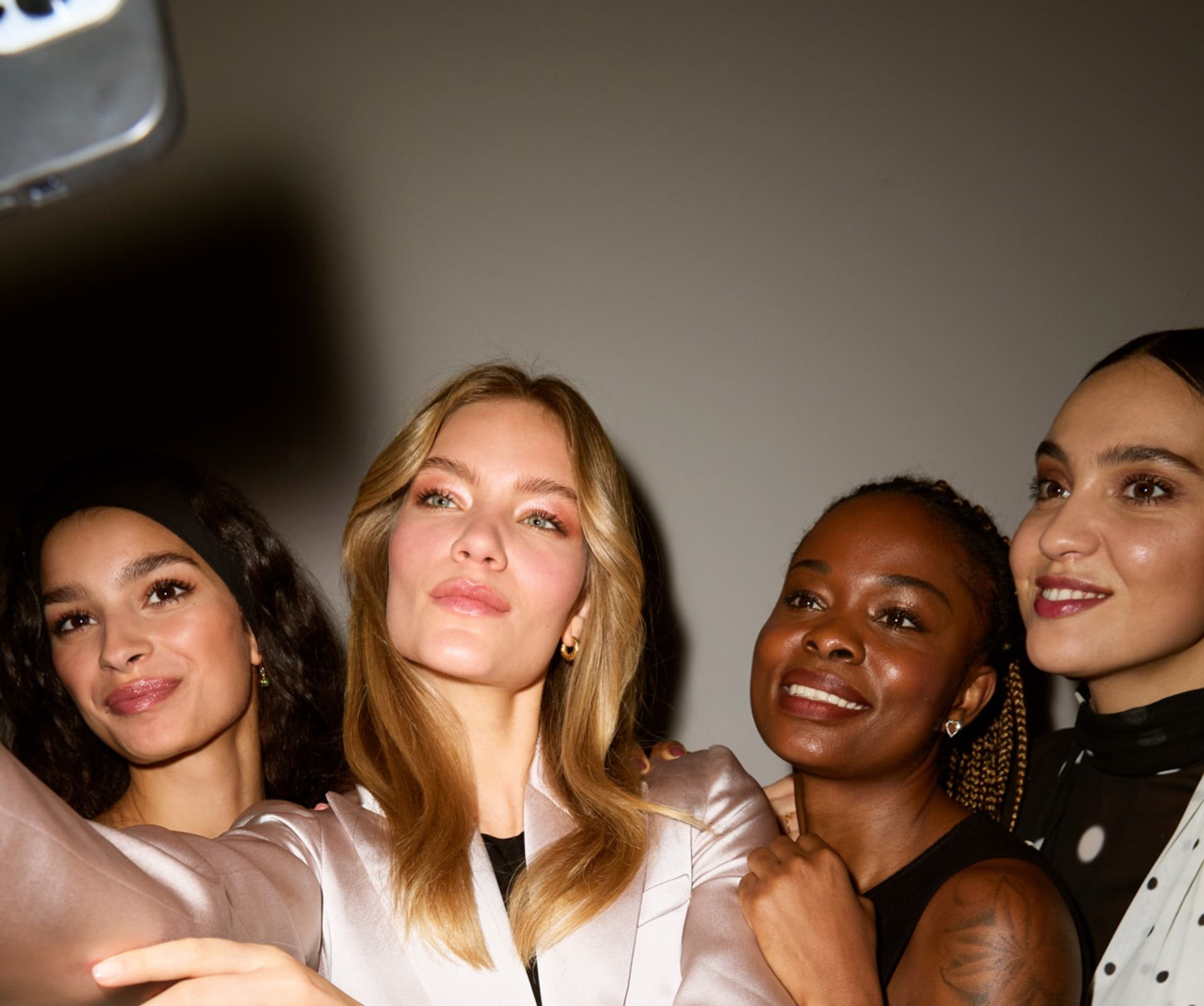 a group of women taking a selfie