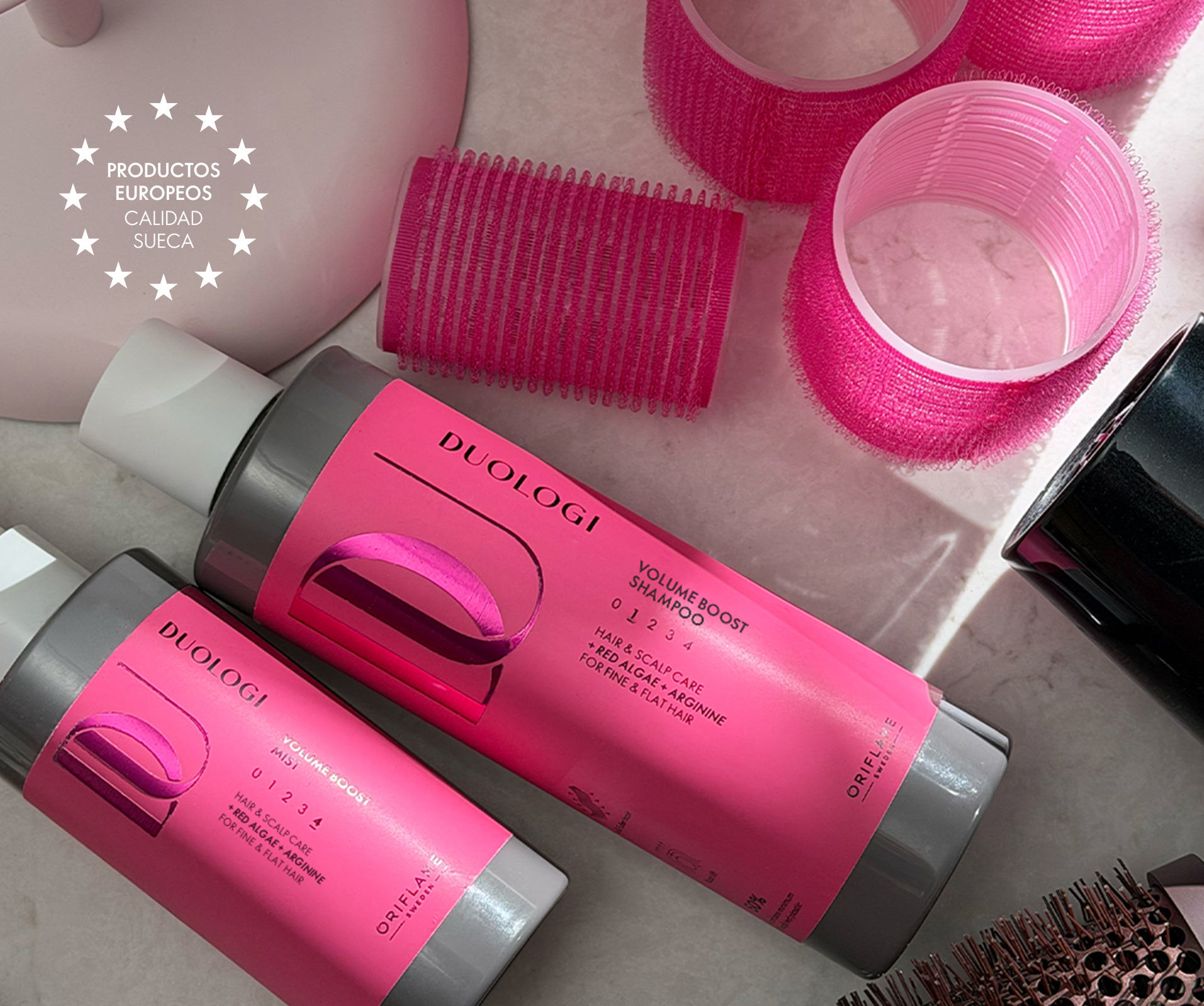 un conjunto de productos para el cabello de color rosa