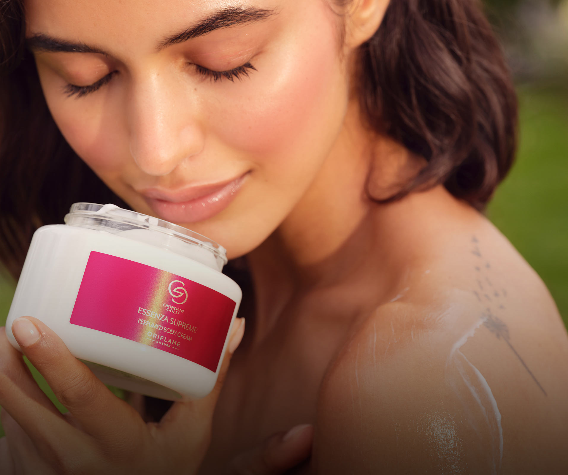 a woman holding a jar of cream