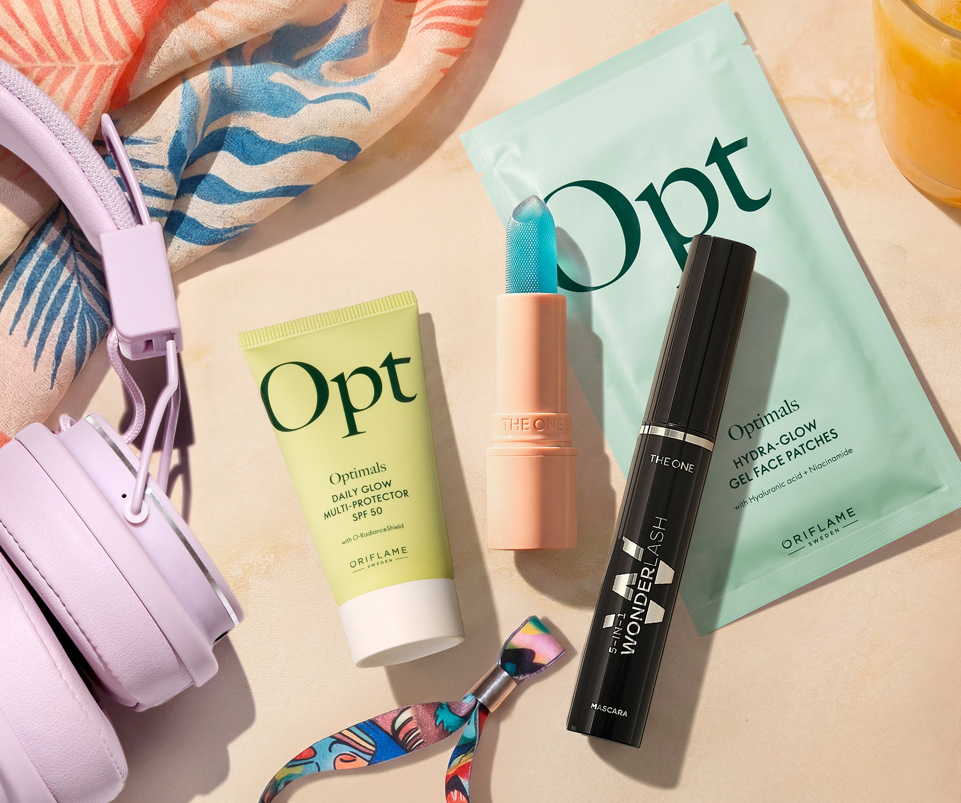 a group of makeup products and a headphones
