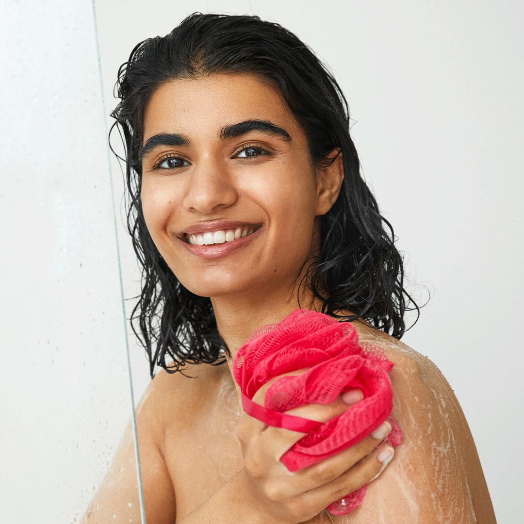 a woman washing her body