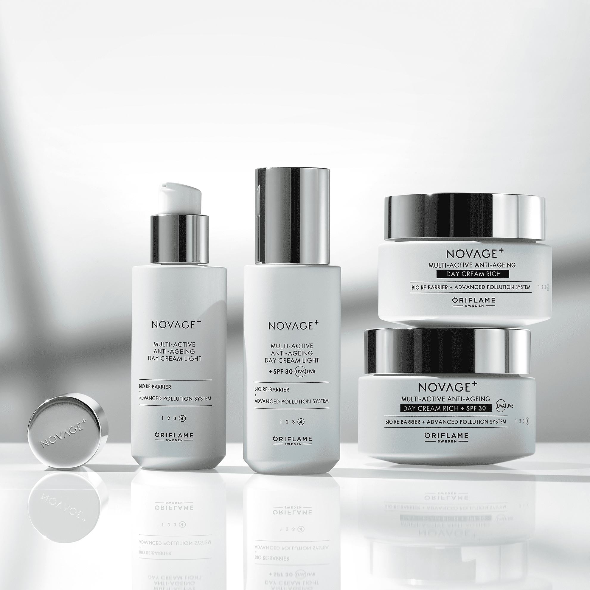 თეთრი კონტეინერების ჯგუფი ვერცხლის თავსახ