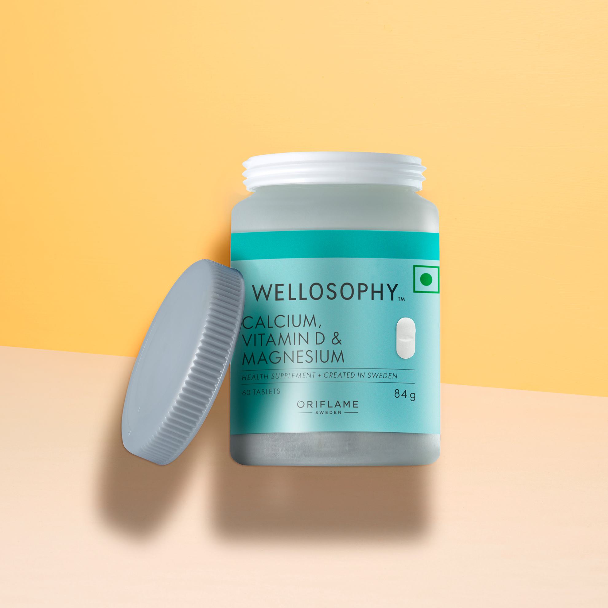 a bottle of medicine with a lid