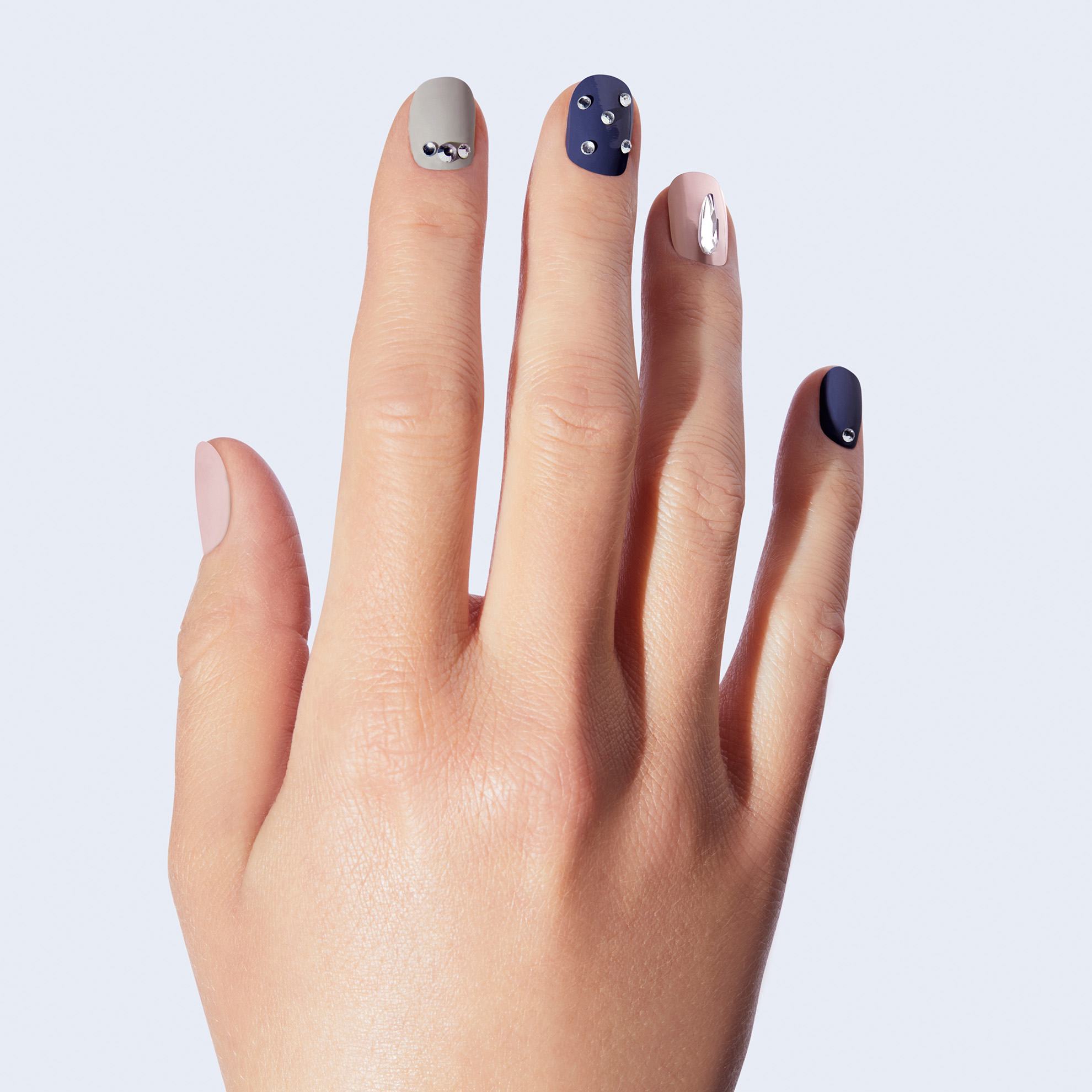 a hand with painted nails