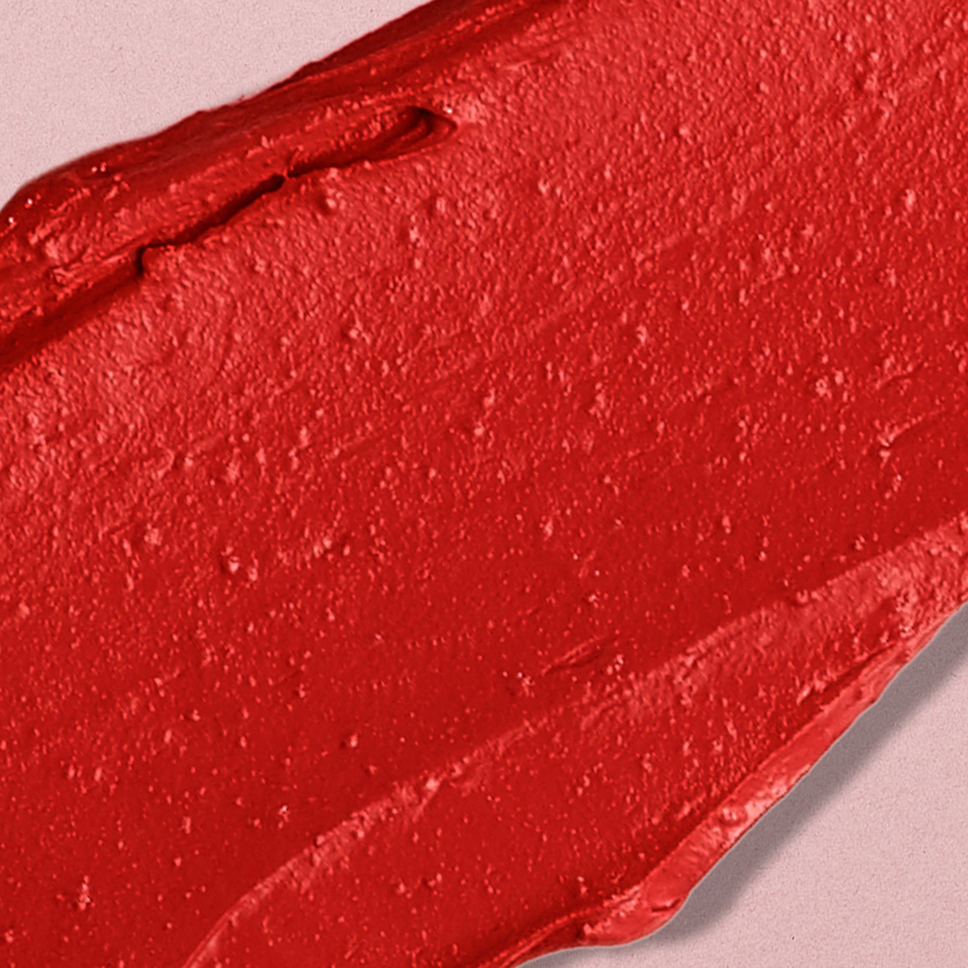 a red smear of lipstick