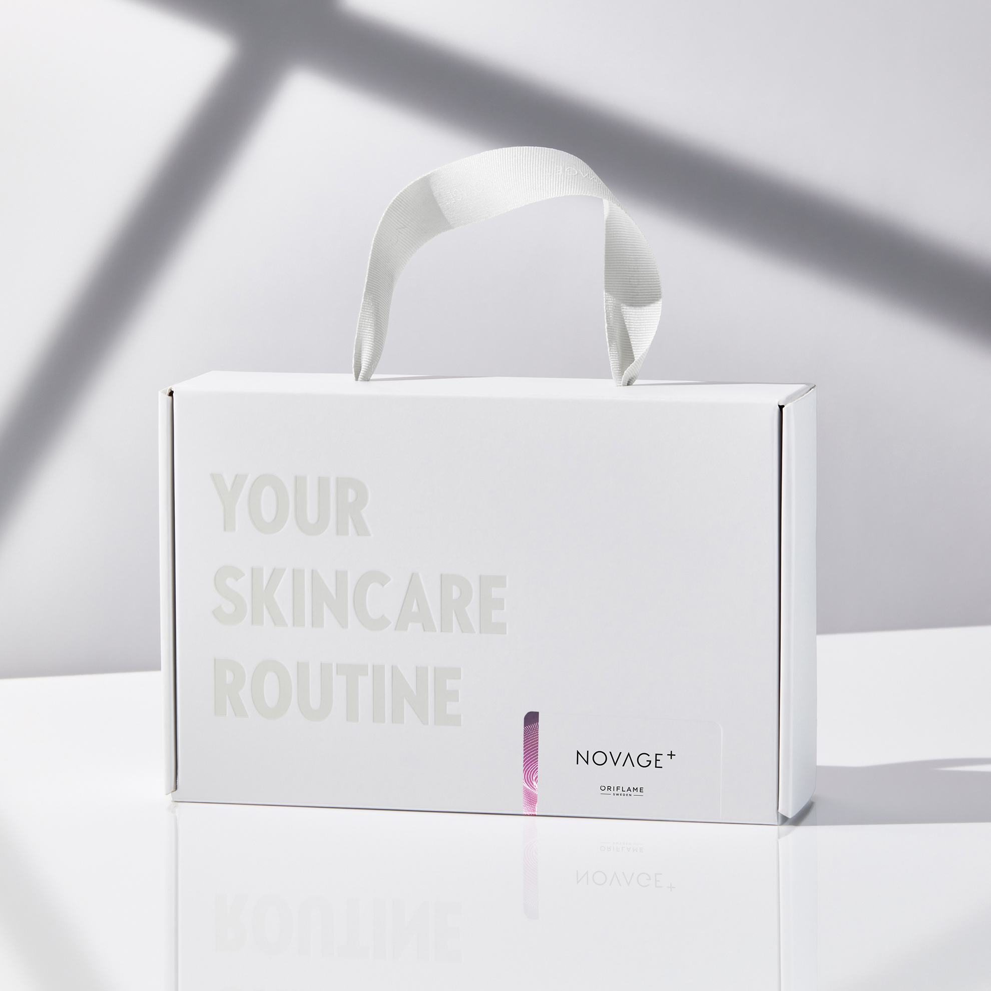 a white box with a handle