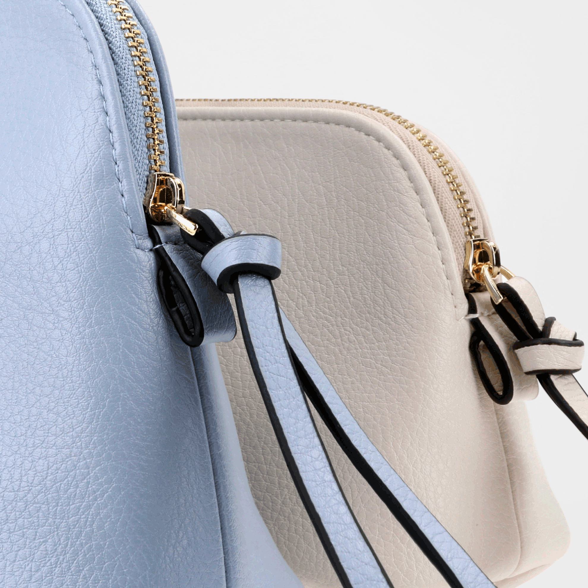 close up of a blue and white purse
