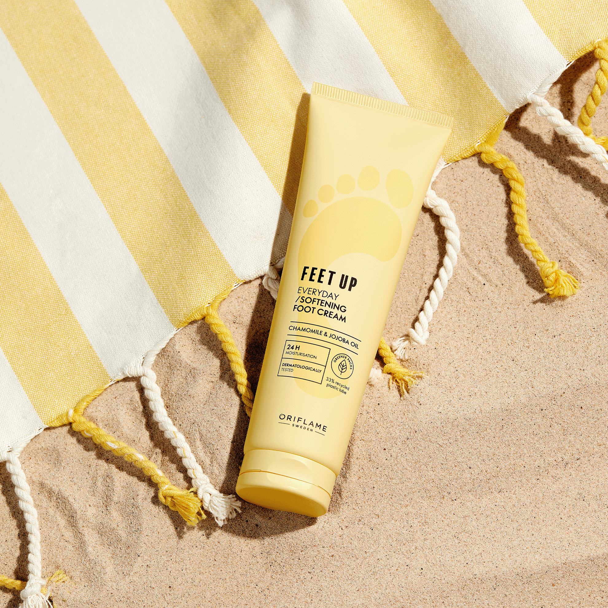 päikesekaitsekreemi tuub rannarätikul