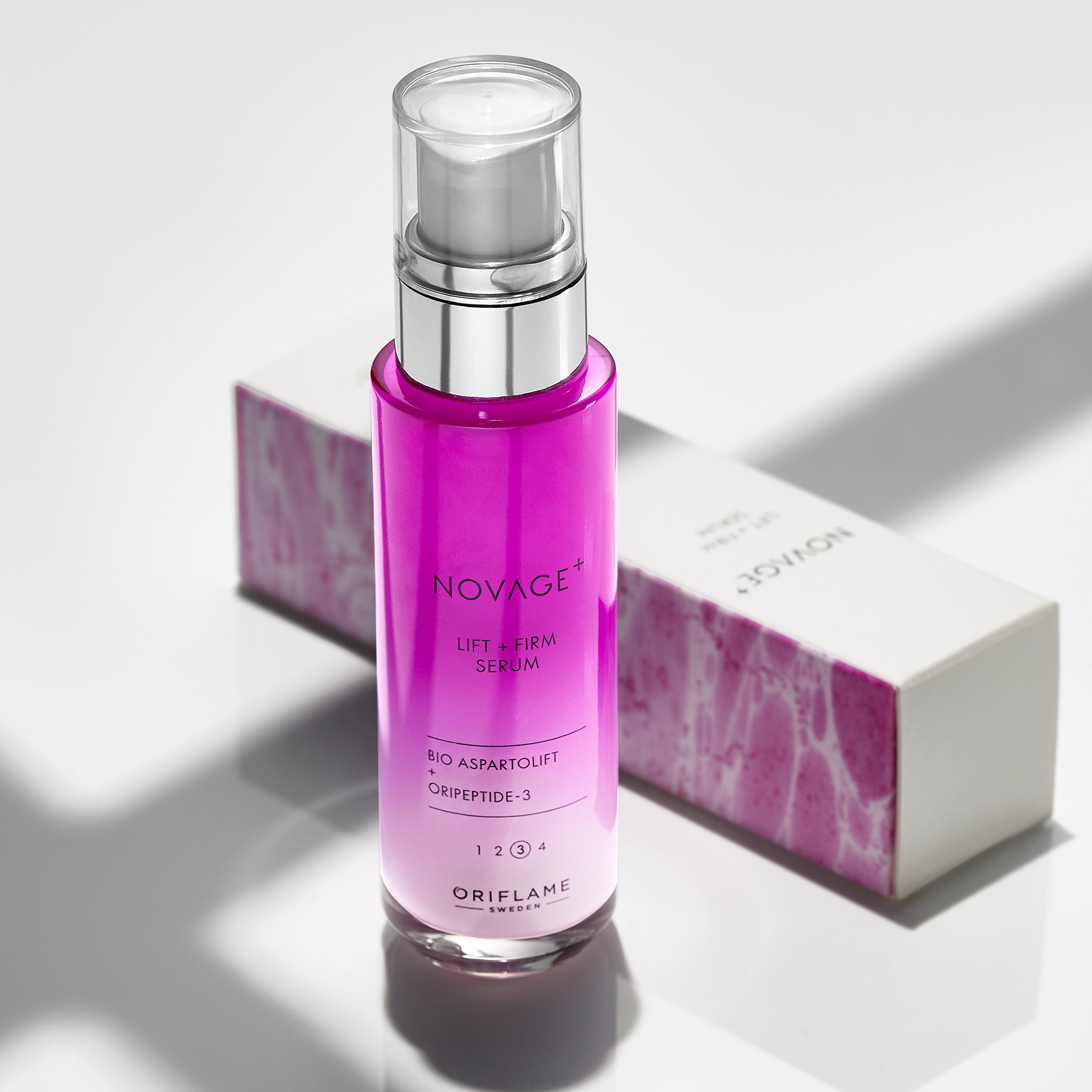 a pink bottle of liquid