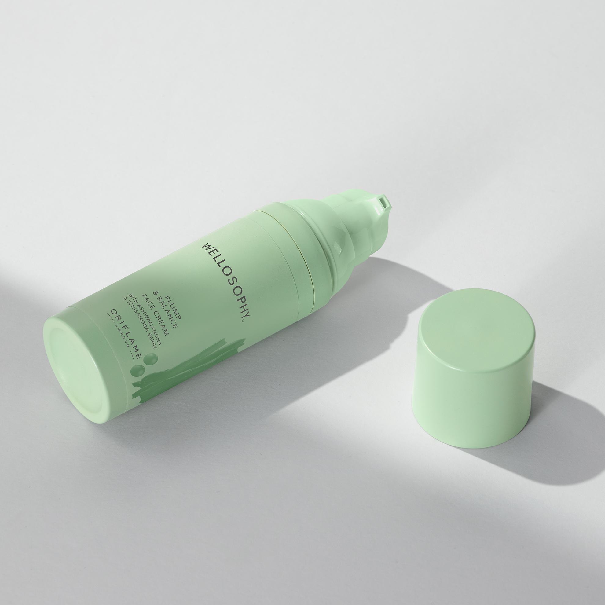 žalias kremo buteliukas