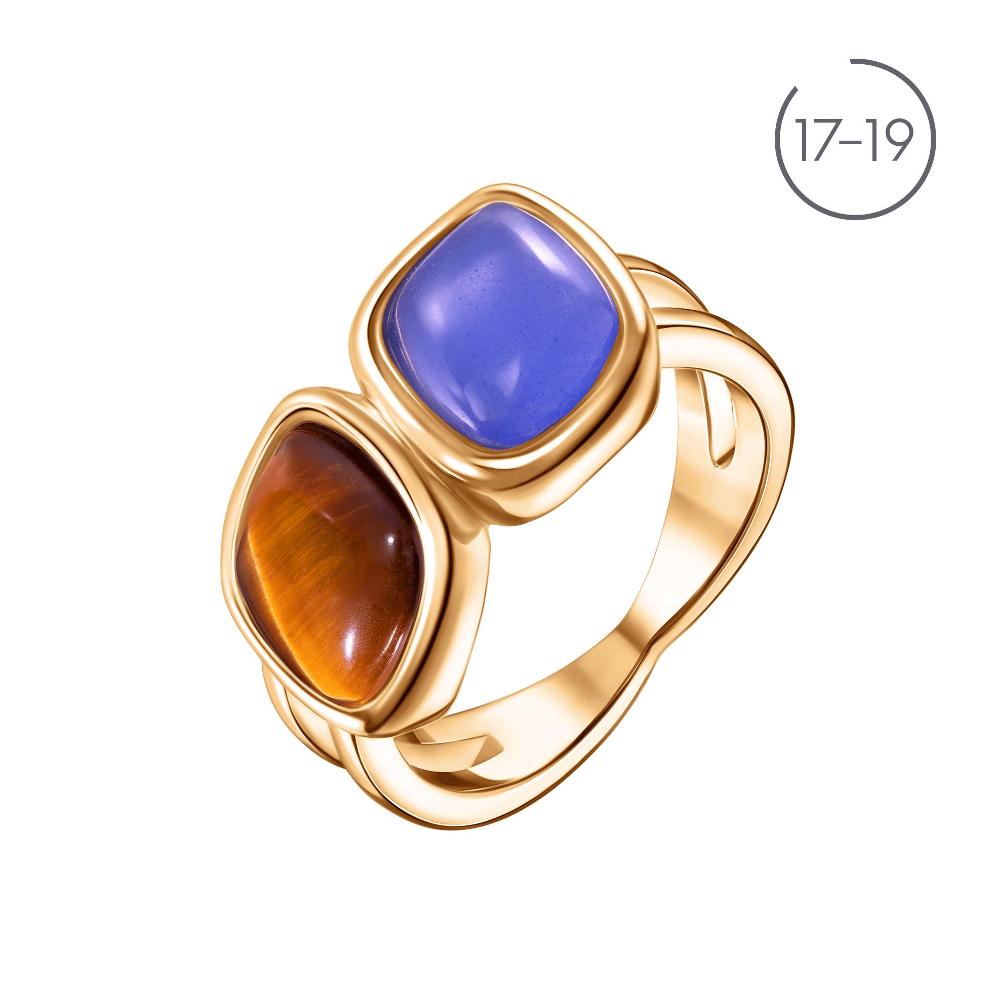Un anillo de oro con piedras azules y marrones.