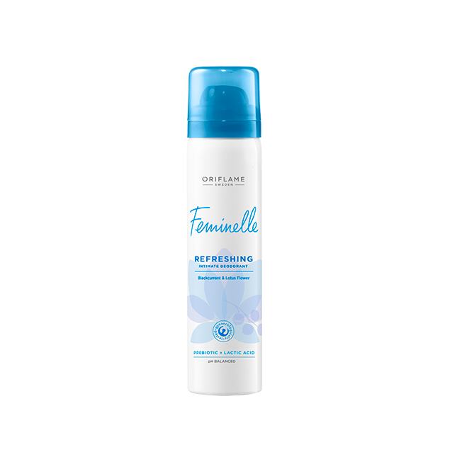 Un frasco blanco y azul con tapa azul.