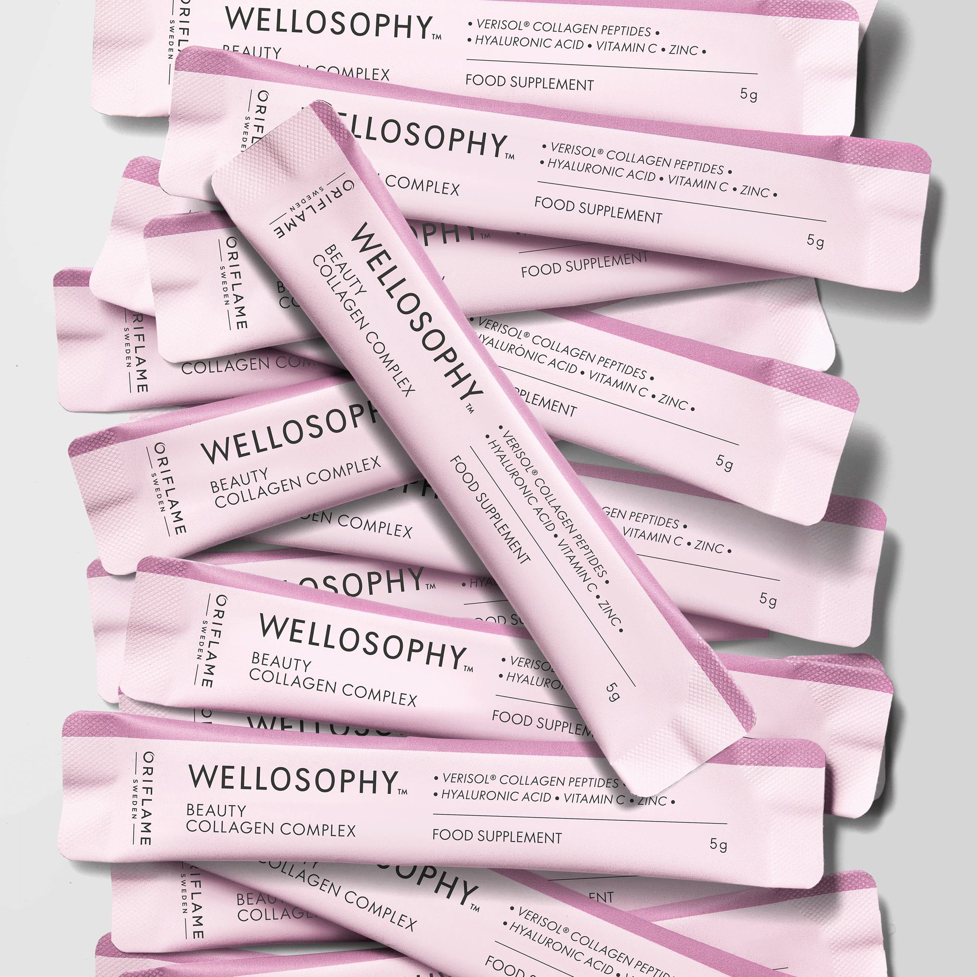 rozā iepakojumu grupa ar melnu tekstu