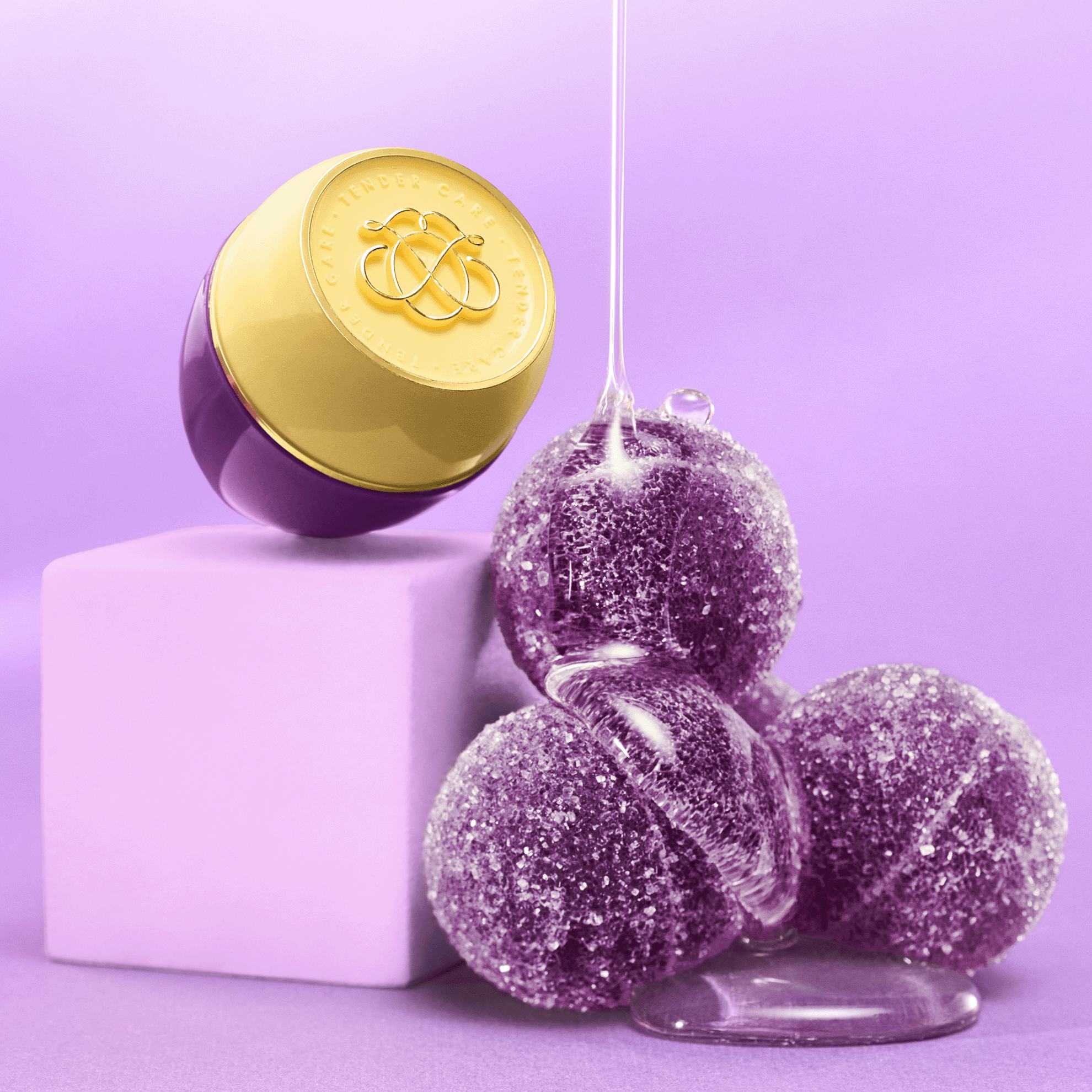 un obiect rotund violet cu capac galben