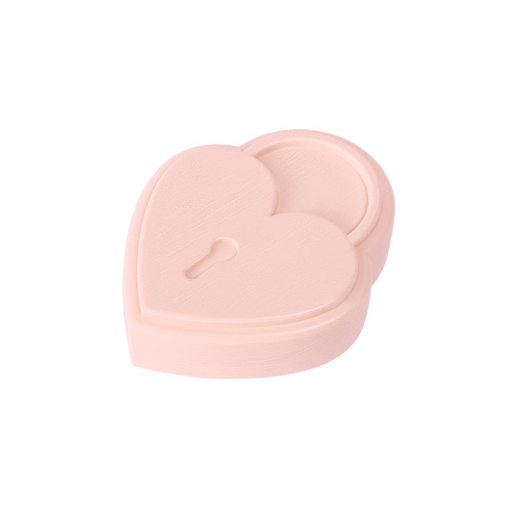 uma caixa rosa em forma de coração