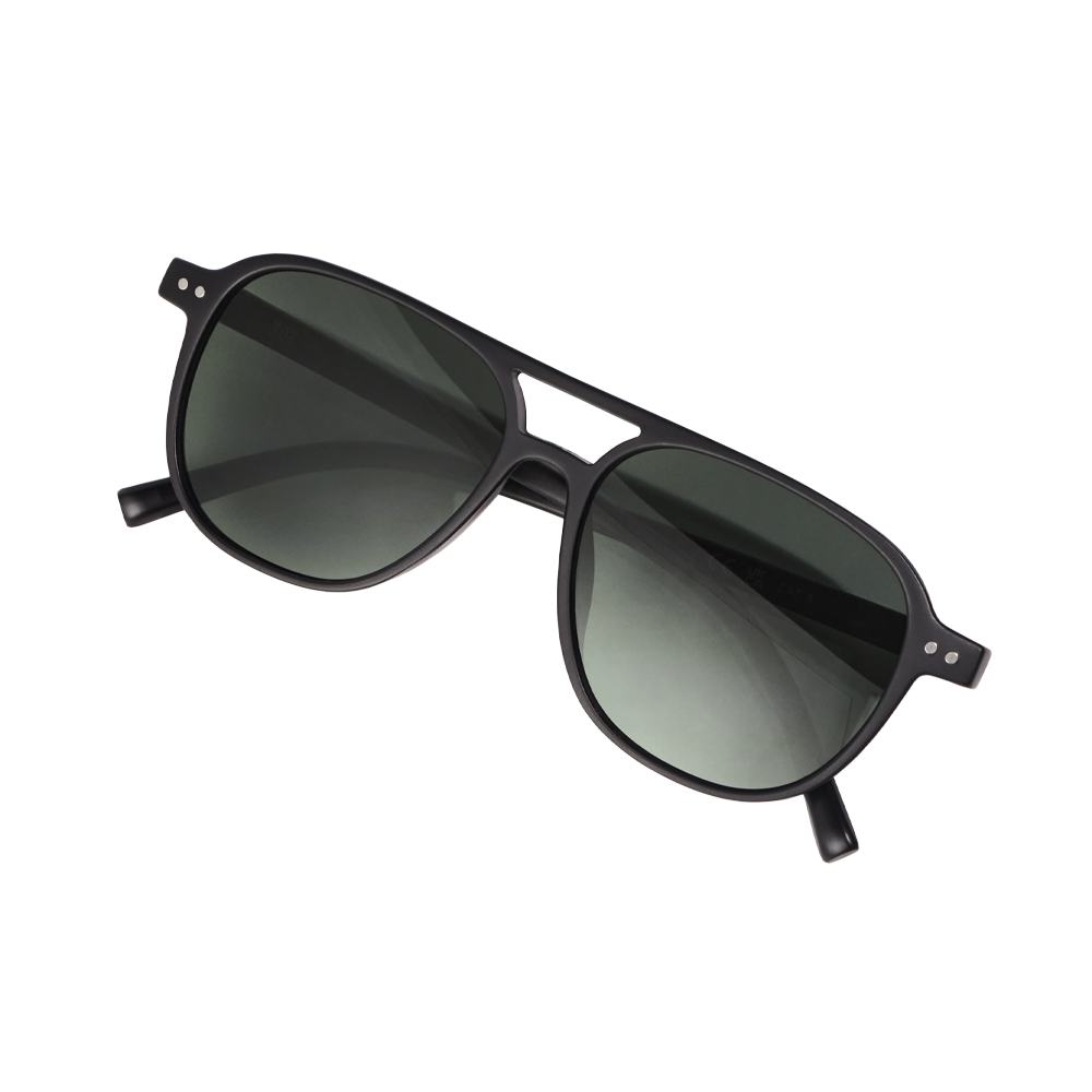 a black sunglasses with green lenses