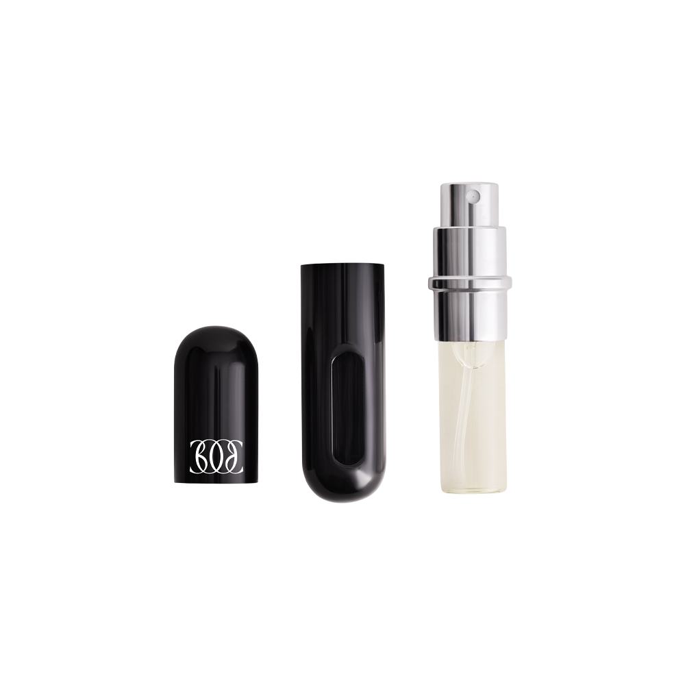 κοντινό πλάνο ενός μπουκαλιού αρώματος