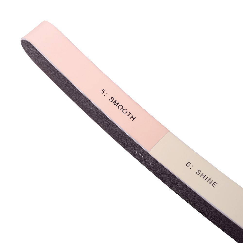 een roze en witte nagelvijl