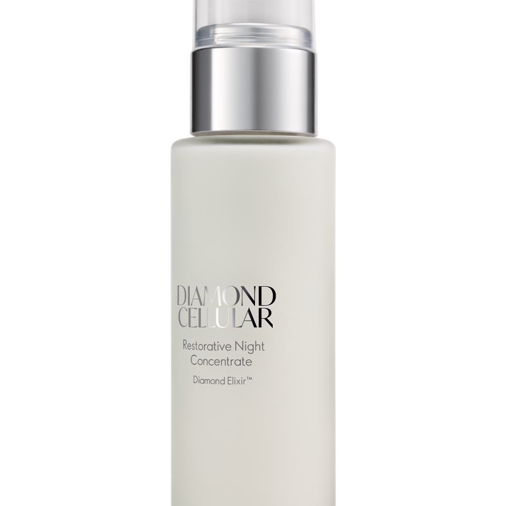 een witte fles met een zilveren dop