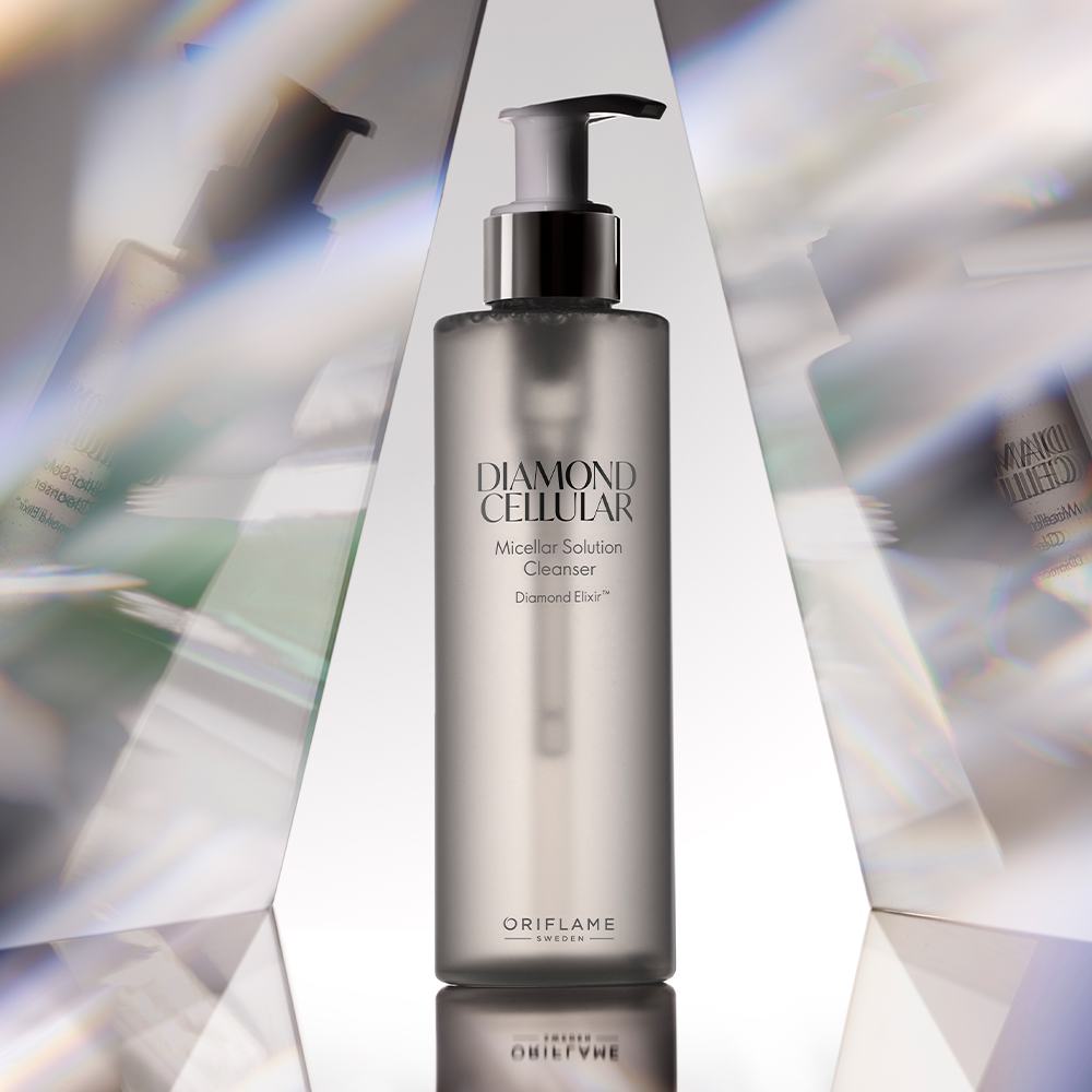 en flaska med vätska och en doserare