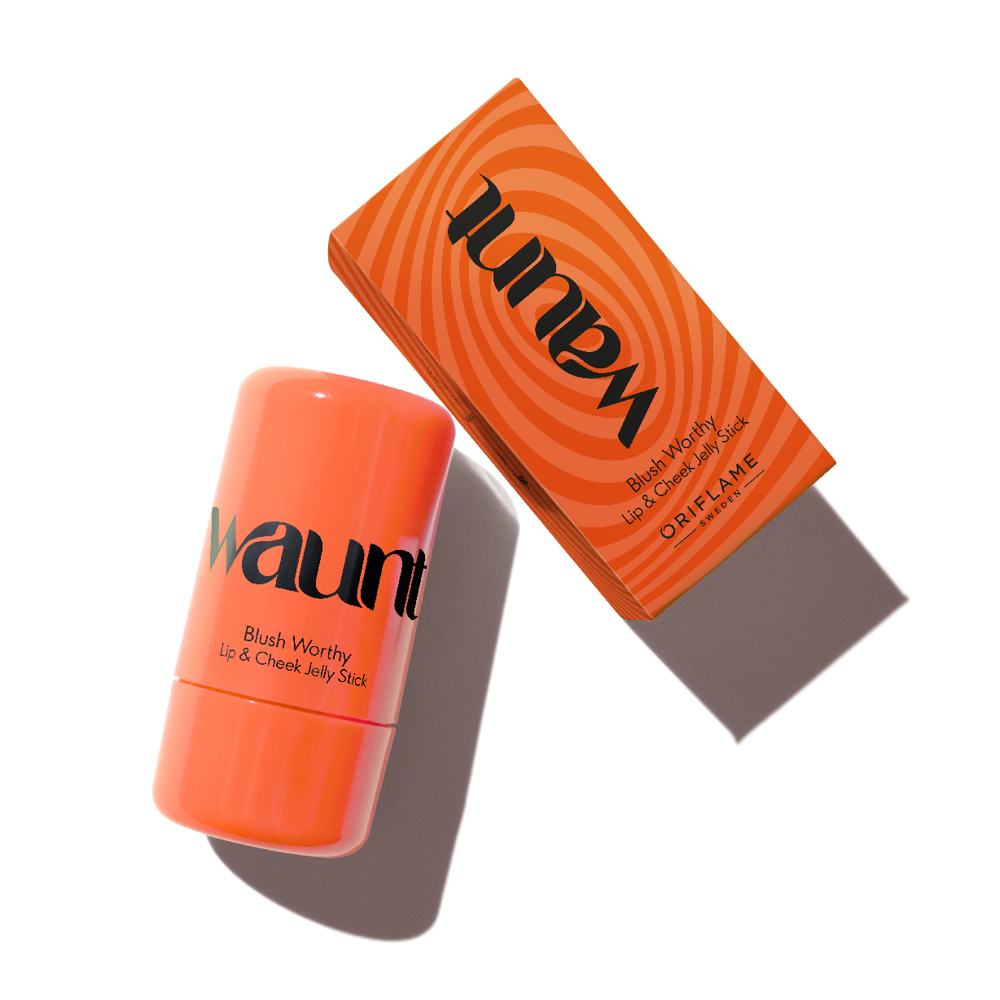 pomarańczowa tubka z czarnym tekstem