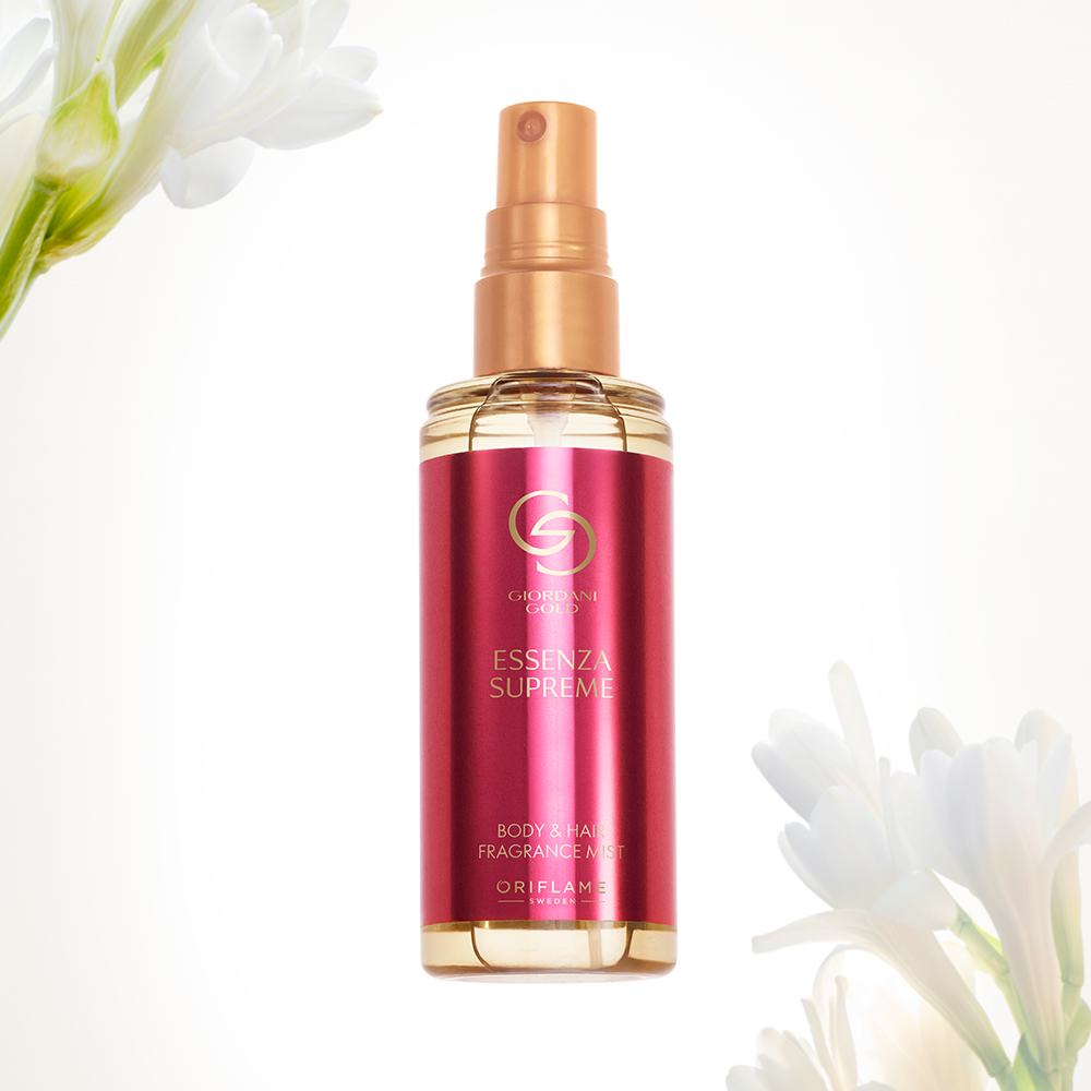 en flaske væske med en forstøver