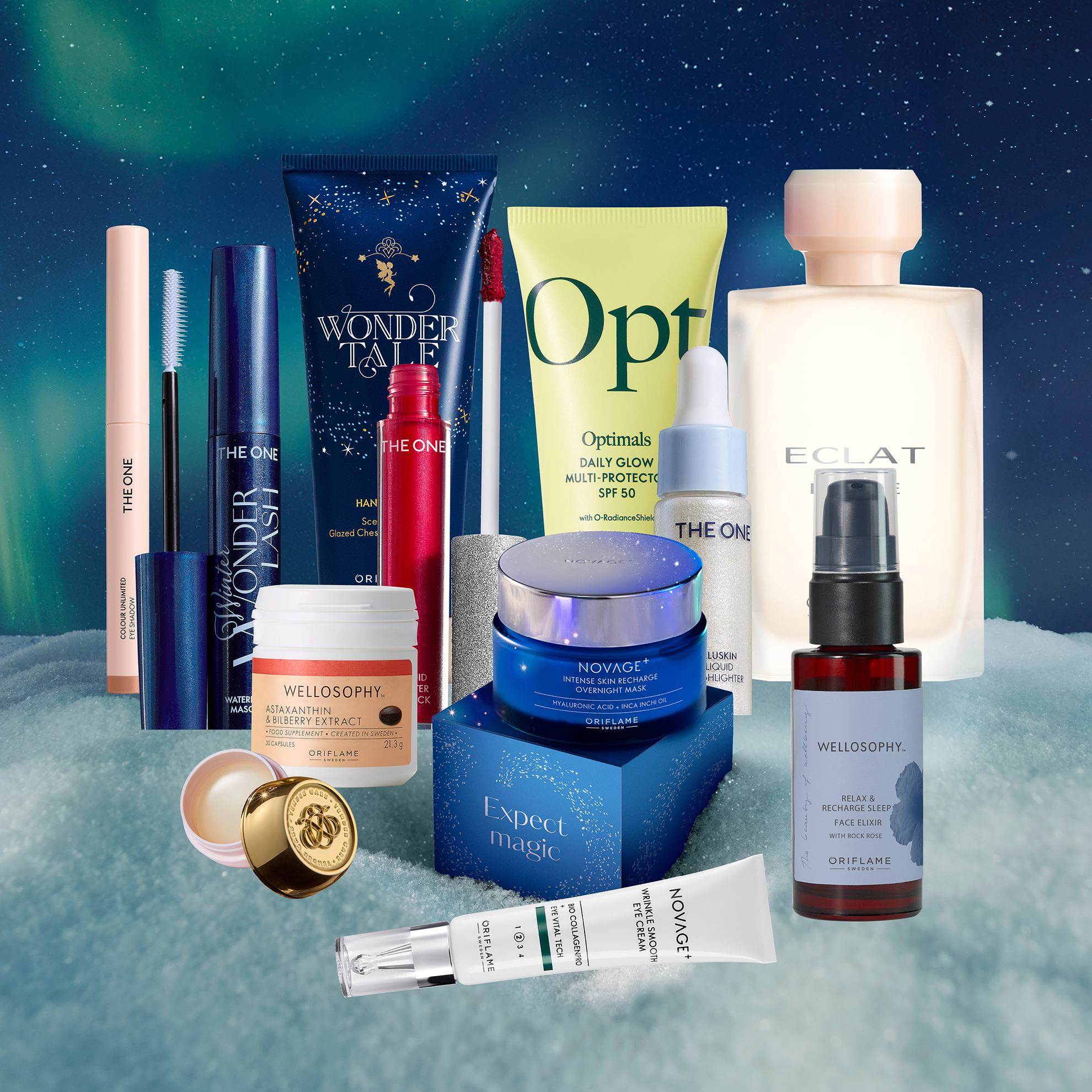 група косметичних продуктів на снігу