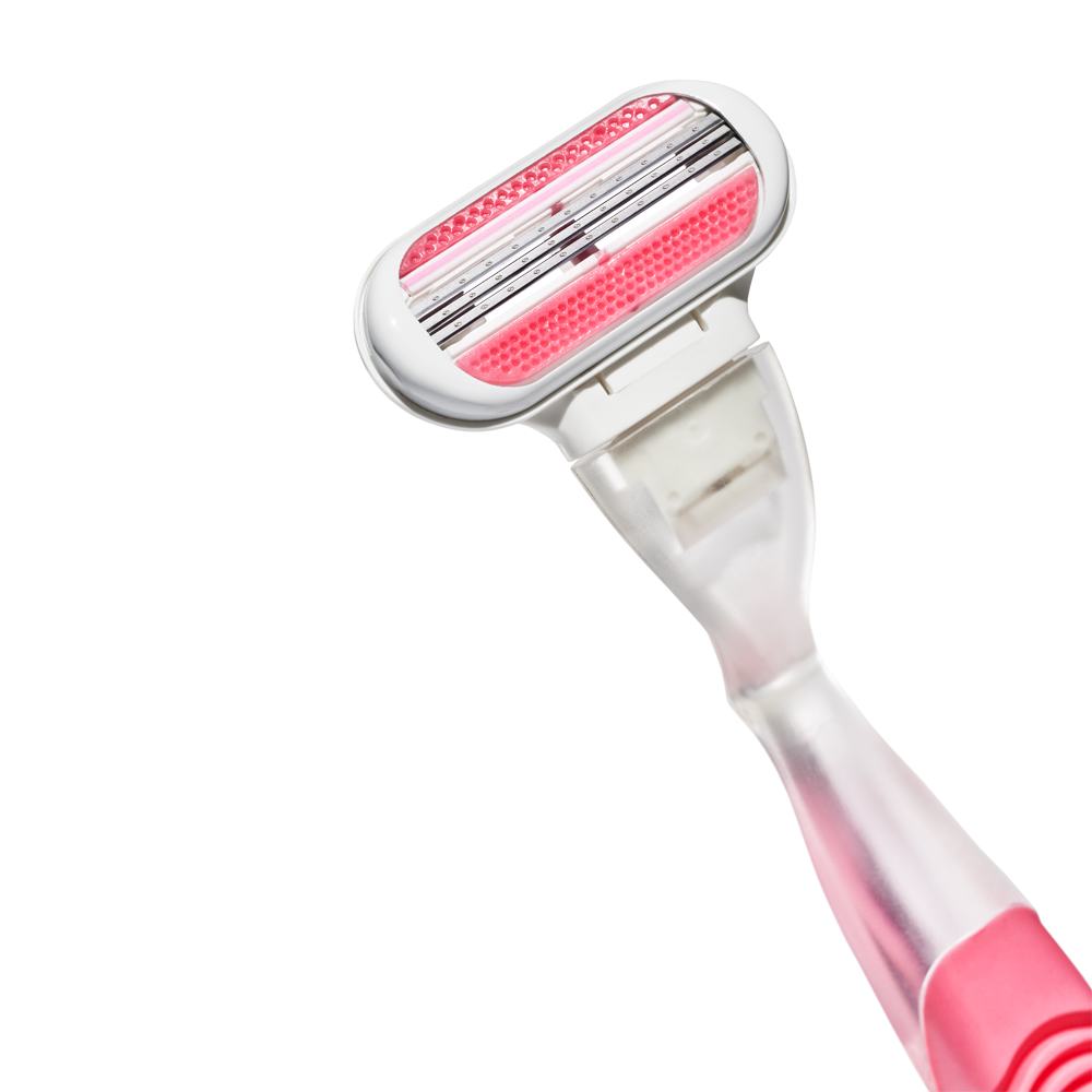 ένα ροζ ξυράφι με ροζ λαβή