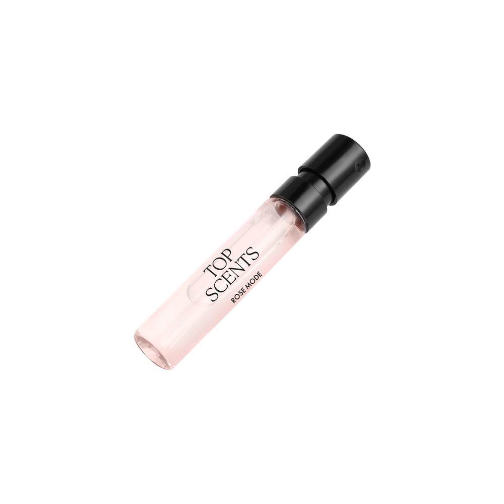 um frasco rosa com tampa preta