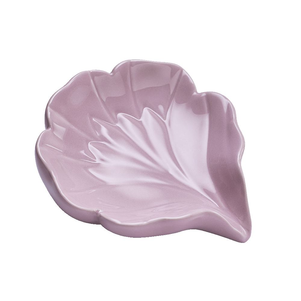 un vas ceramic roz în formă de frunză