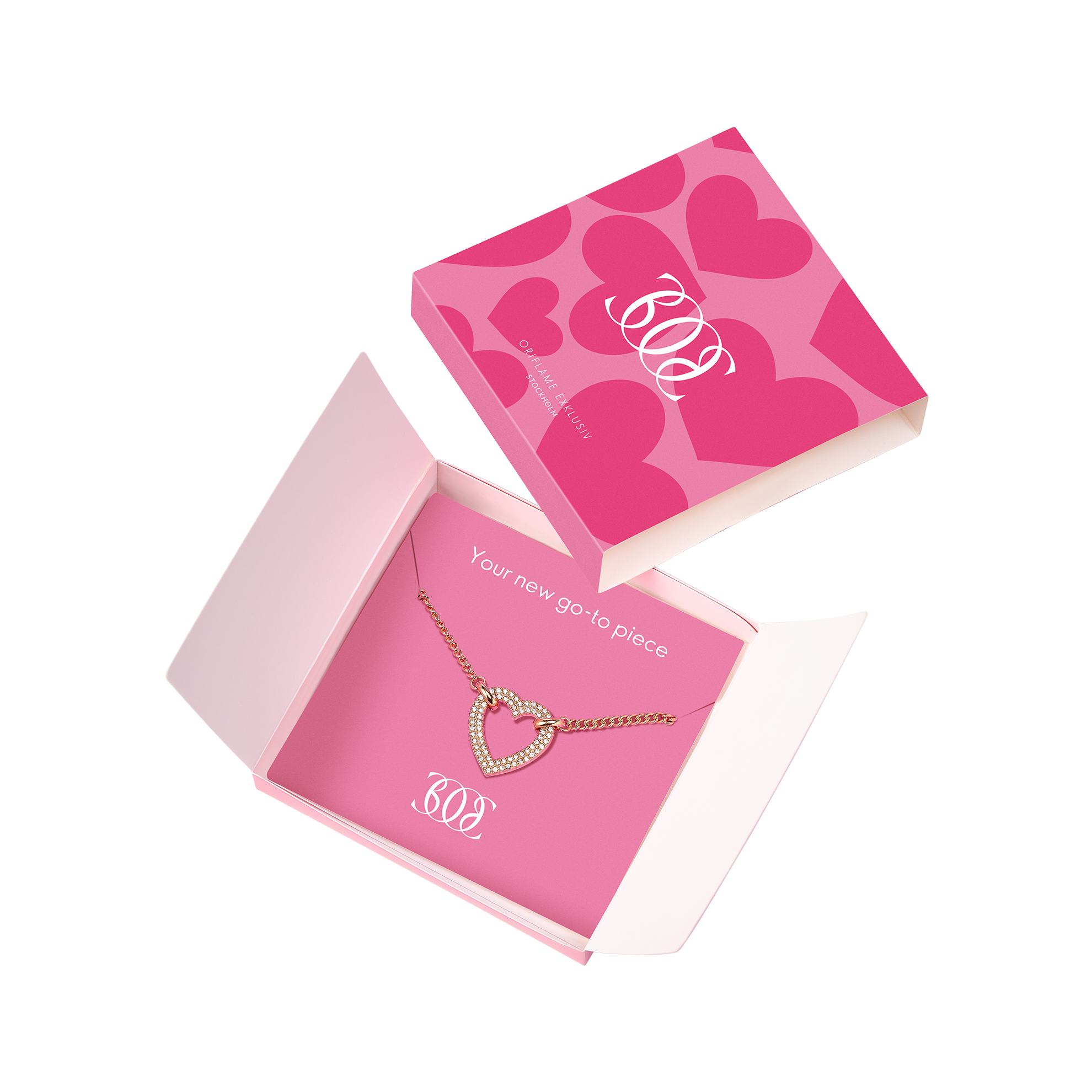 kotak pink dengan kalung di dalamnya