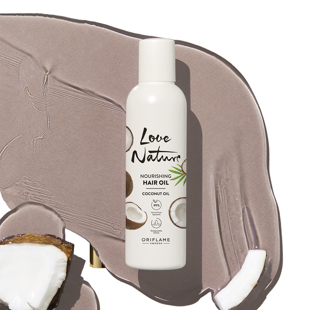 eine Flasche Haaröl auf einer braunen Oberfläche