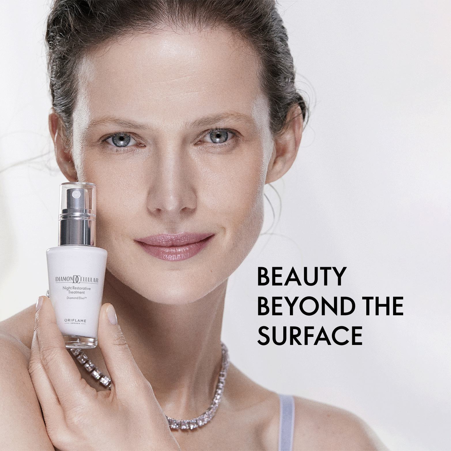 a woman holding a bottle of cream