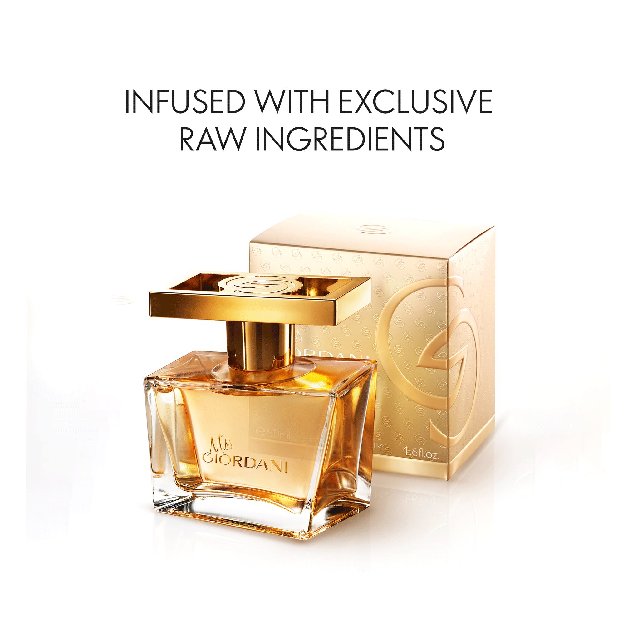 a bottle of perfume in a gold box