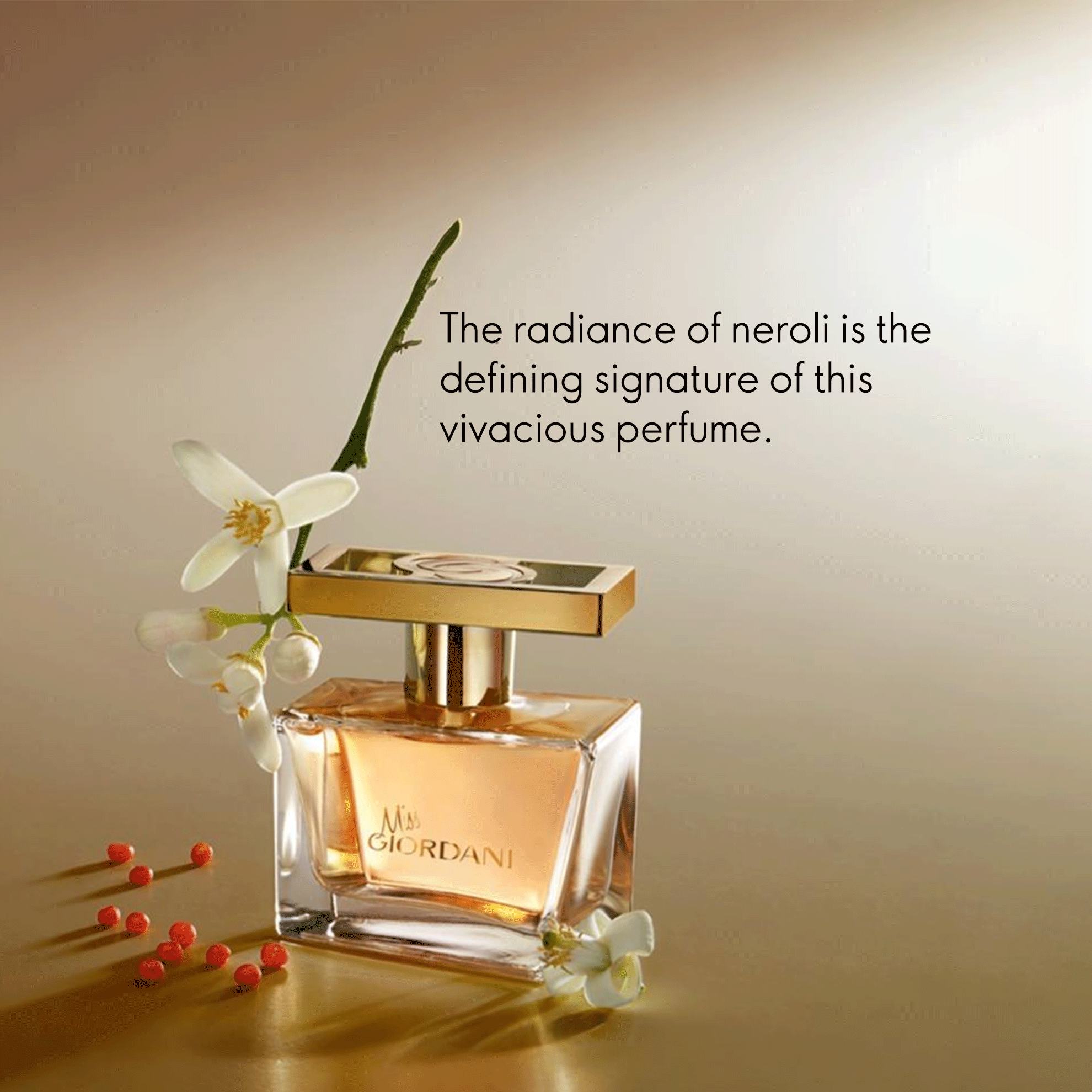 a bottle of perfume with flowers