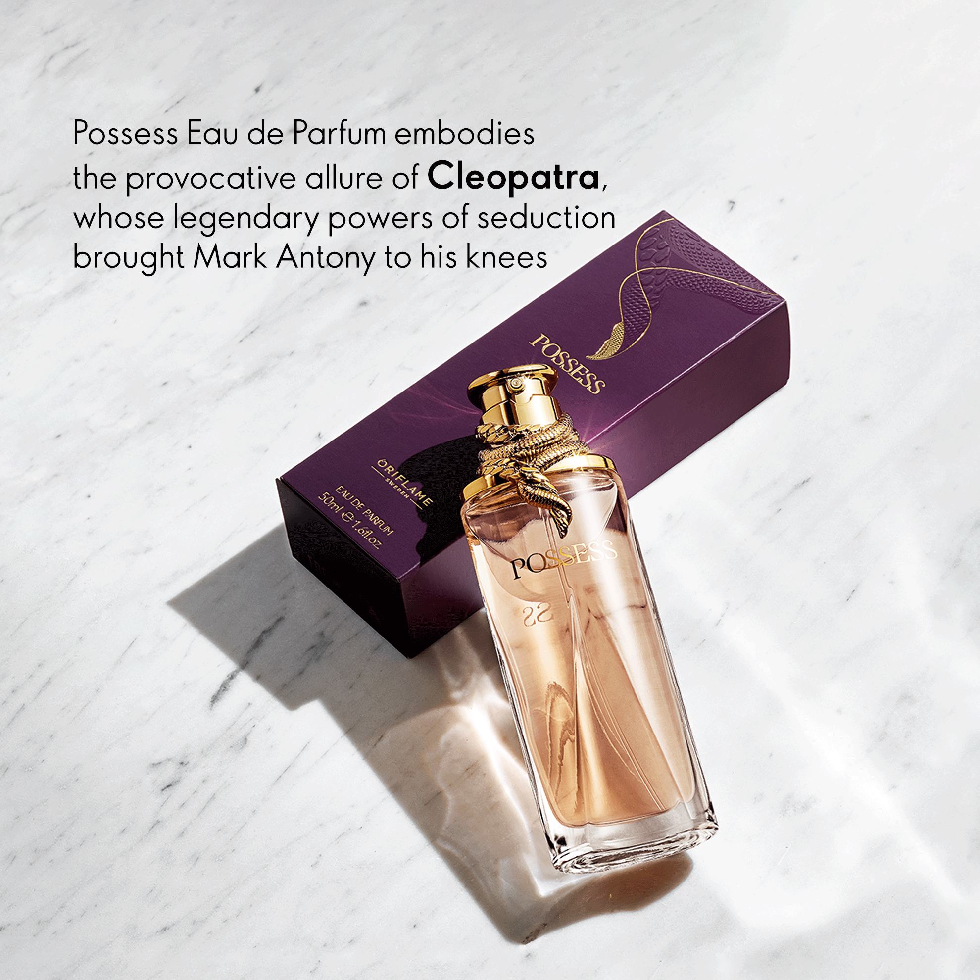 a bottle of perfume on a marble surface