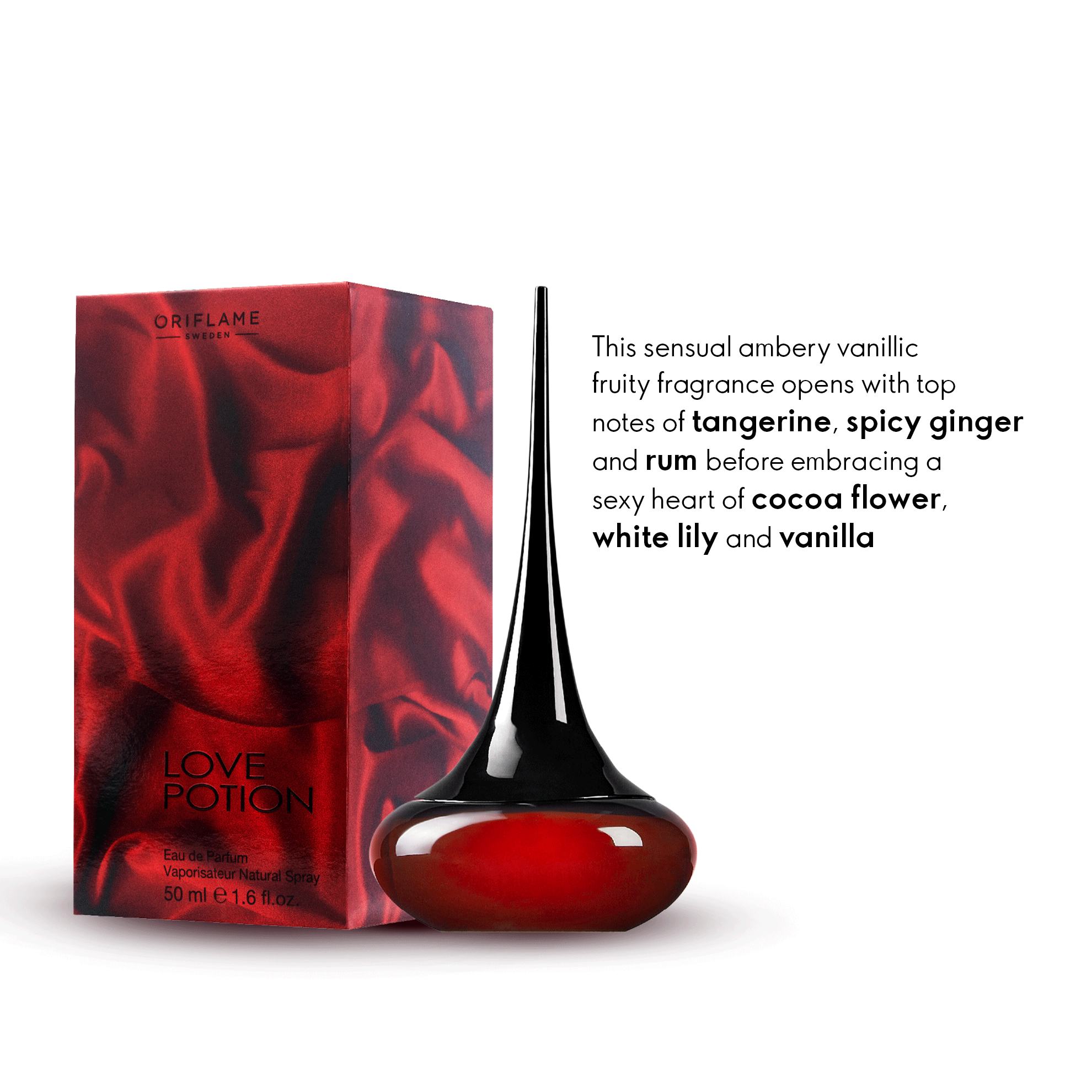 a red and black perfume bottle next to a box
