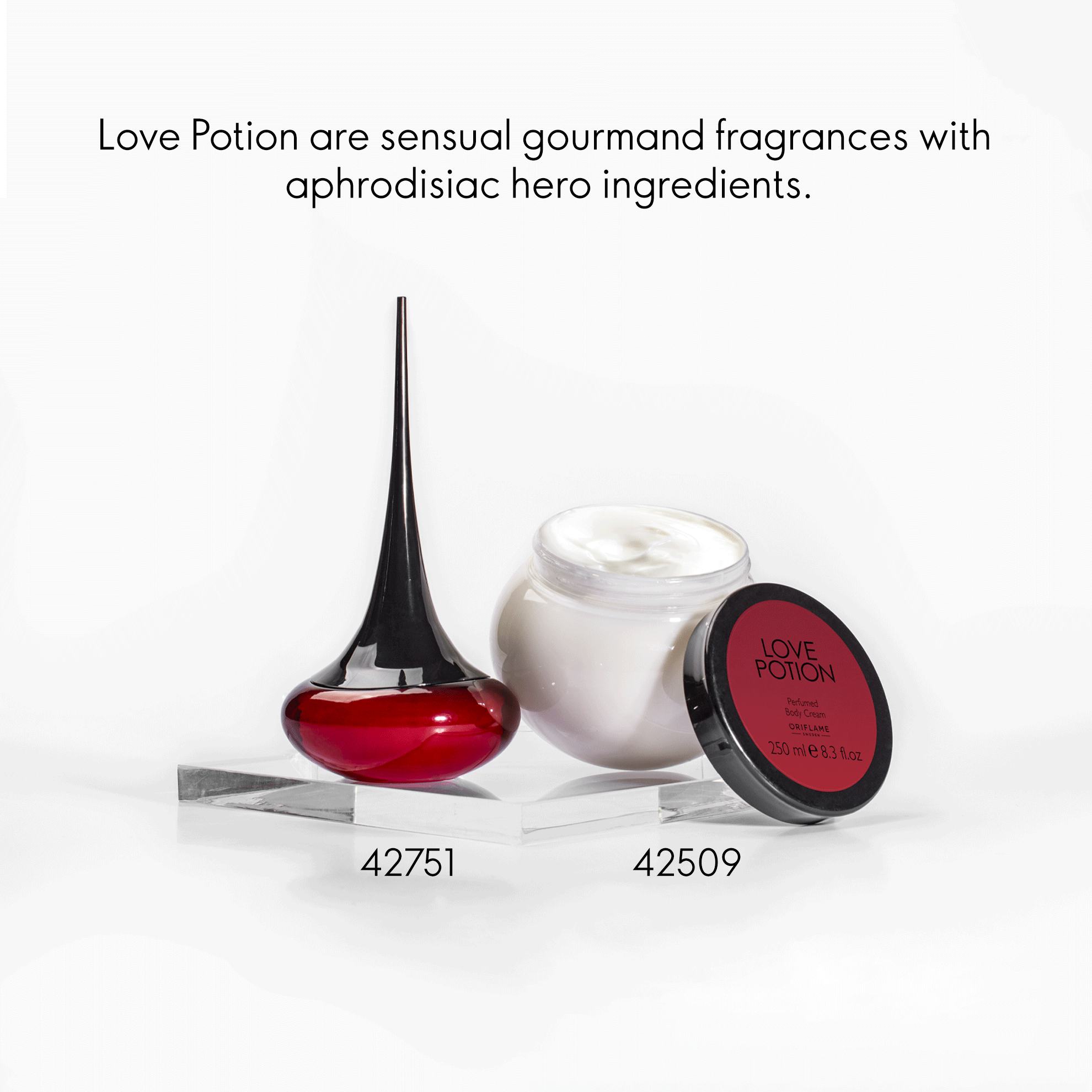 a red and white container with a black tip and a black lid