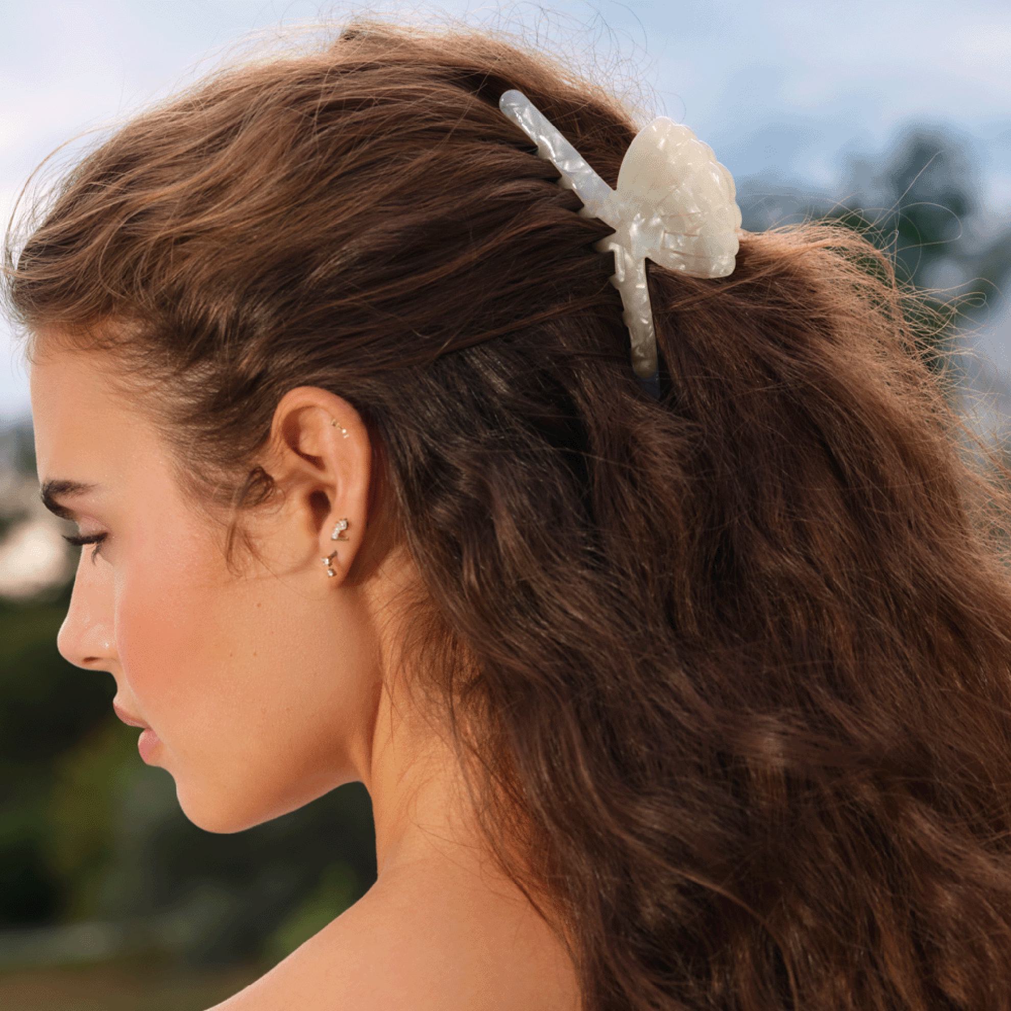 a woman with a hair clip