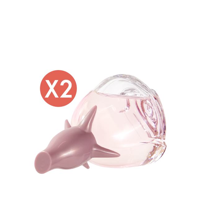 un frasco rosa con punta afilada