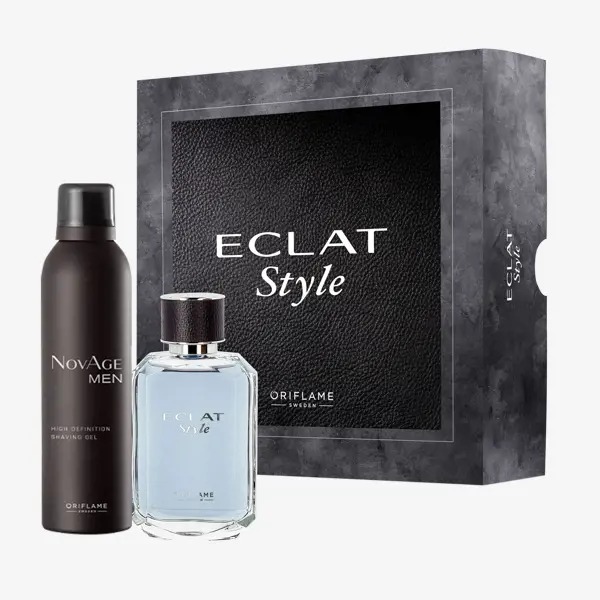 un flacon d'eau de Cologne à côté d'une boîte