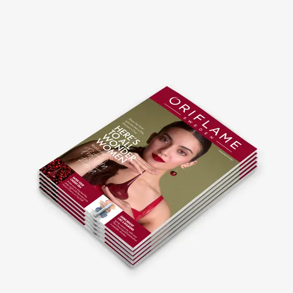 a stack of magazines with a woman on the cover