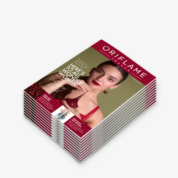 a stack of magazines with a woman on the cover