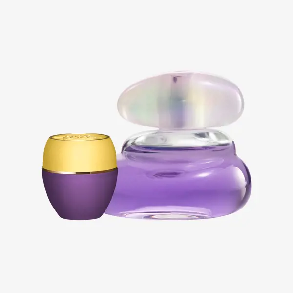 o sticlă violetă cu capac auriu