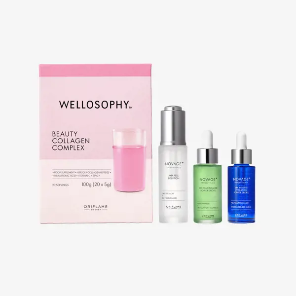 a group of bottles next to a pink box