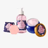 a group of bottles of liquid and a jar of cream