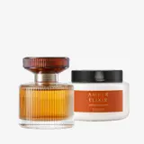 krem kavanozining yonida bir shisha atir